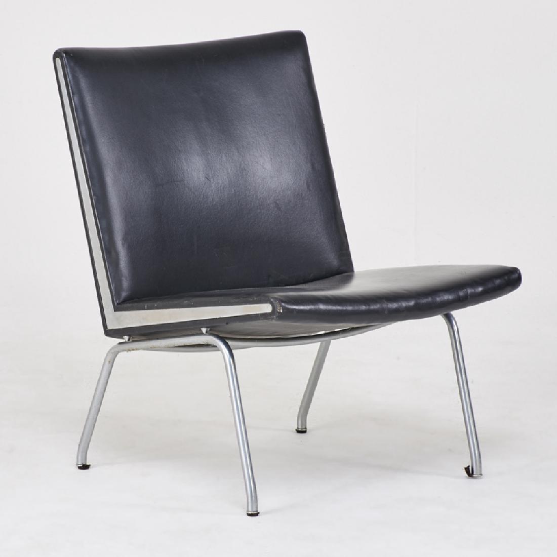 HANS WEGNER: Lounge chair, Denmark, 1960s Matte chromed steel, leather 31" x 23 1/2" x 27"
