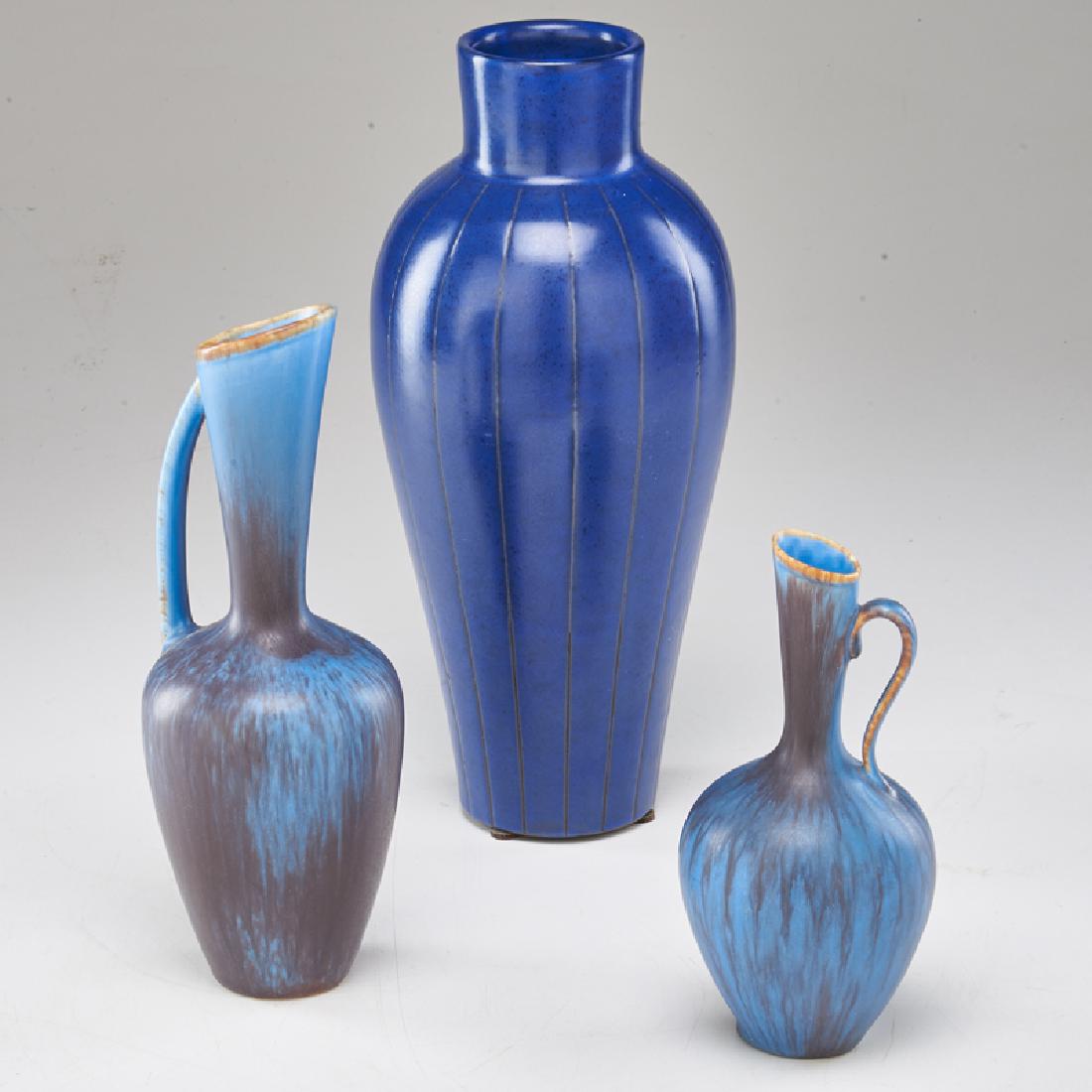 RÖRSTRAND; VICKE LINDSTRAND; UPSALA-EKEBY: Two Rorstrand ewers and Ekeby vase, Sweden, mid 20th c. Glazed porcelain/ceramic All marked Tallest: 11" x 4 1/2" dia.