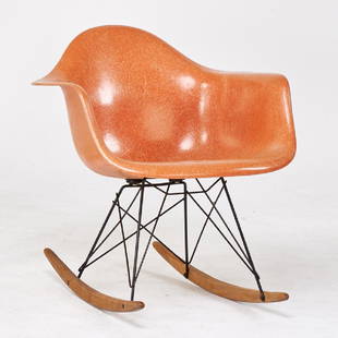 CHARLES AND RAY EAMES; HERMAN MILLER: RAR rocking chair, Zeeland, MI, 1960s Reinforced fiberglass, birch Signed: 27" x 24 1/2" x 25"