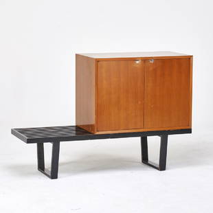 GEORGE NELSON (1908 - 1986); HERMAN MILLER: Cabinet raised on slat bench, Zeeland, MI, 1950s Walnut, enameled wood, zinc-plated metal Unmarked Bench: 14" x 56 1/2" x 18 1/2", cabinet: 24" x 34" x 18 1/2"