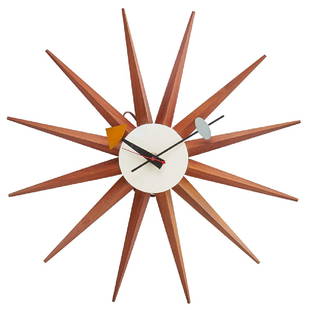 GEORGE NELSON; HOWARD MILLER: "Spike" electric wall clock, Zeeland, MI, 1950s Wood, enameled metal Stamped, remnants of decal 2 3/4" x 19" dia.