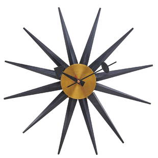 GEORGE NELSON; HOWARD MILLER: "Spike" electric wall clock, Zeeland, MI, 1950s Painted wood, enameled metal, brass Stamped, decal 2 3/4" x 19" dia.