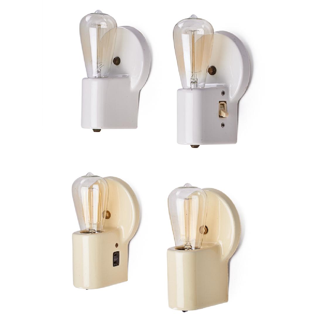 WILLIAM LESCAZE (1896-1969); PASS & SEYMOUR: Four sconces, USA, 1930s Glazed porcelain, Bakelite, brass, single sockets Manufacturer mark to one, paper labels to two Approx. 7" x 4 3/4" x 4" ea.