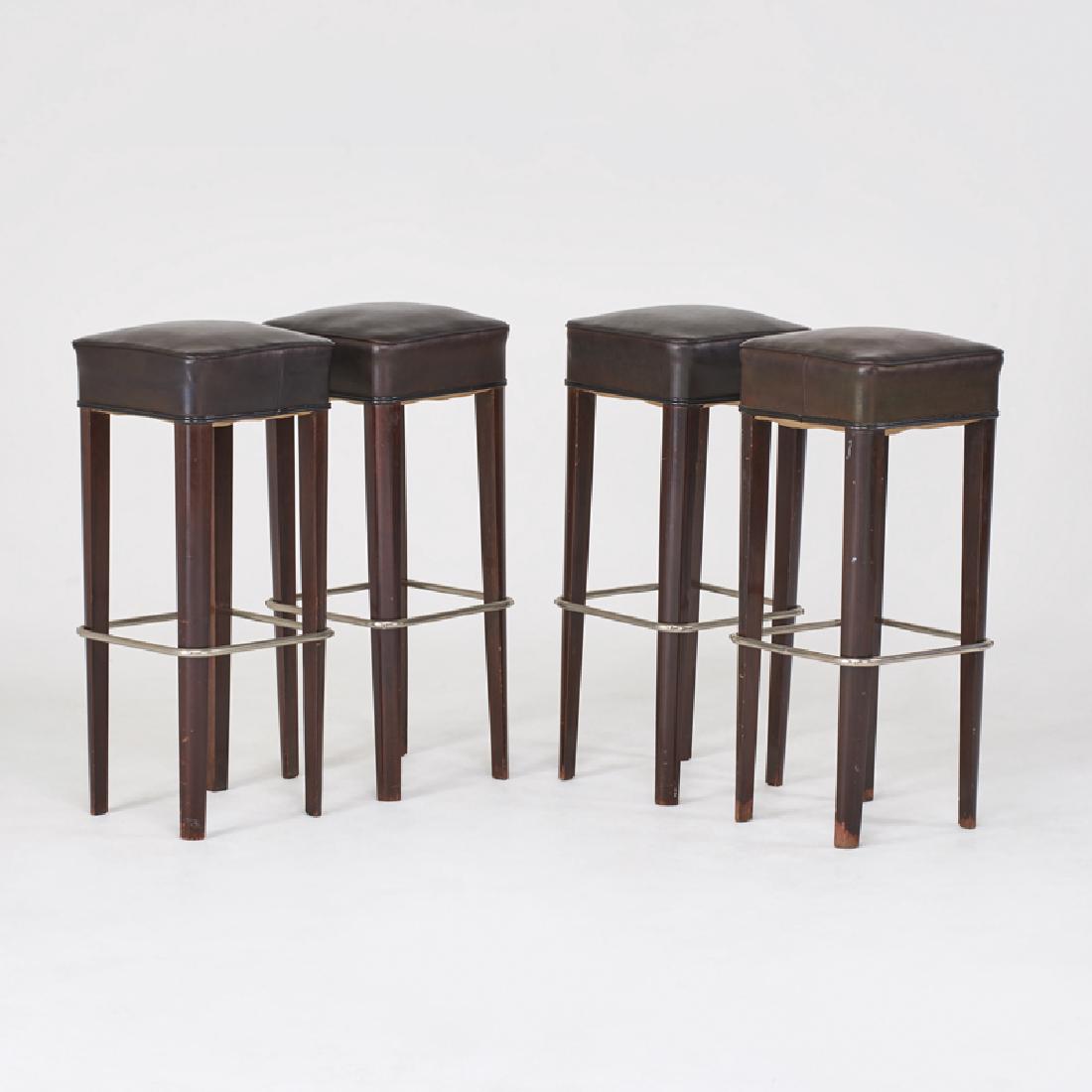 THONET: Four barstools, NY, 1950s Stained wood, chromed steel, vinyl upholstery Unmarked 33 1/2" x 13" sq.