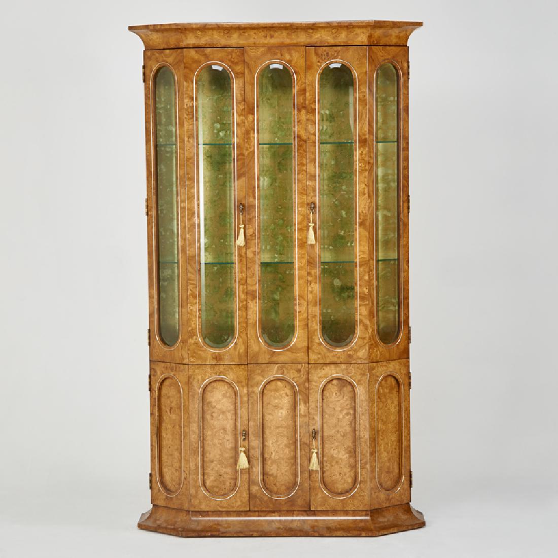 MASTERCRAFT: Iluminated clip-corner vitrine, USA, 1980s Burlwood, brass, beveled glass, foil back Unmarked 81" x 46 1/2" x 16"
