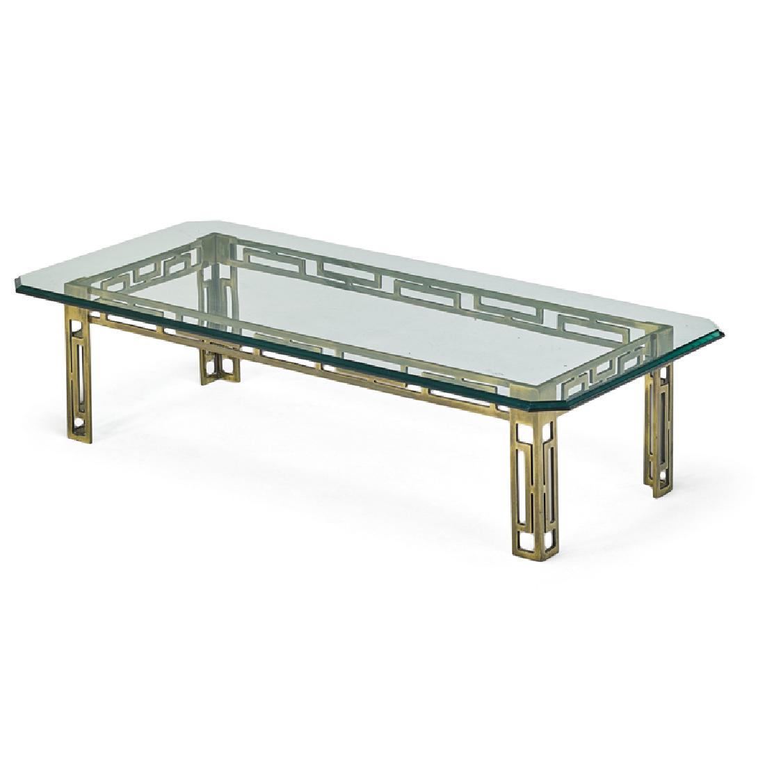 MASTERCRAFT: Coffee table, USA, 1980s Bronzed steel, beveled glass Unmarked 16 1/2" x 65" x 31 1/2"