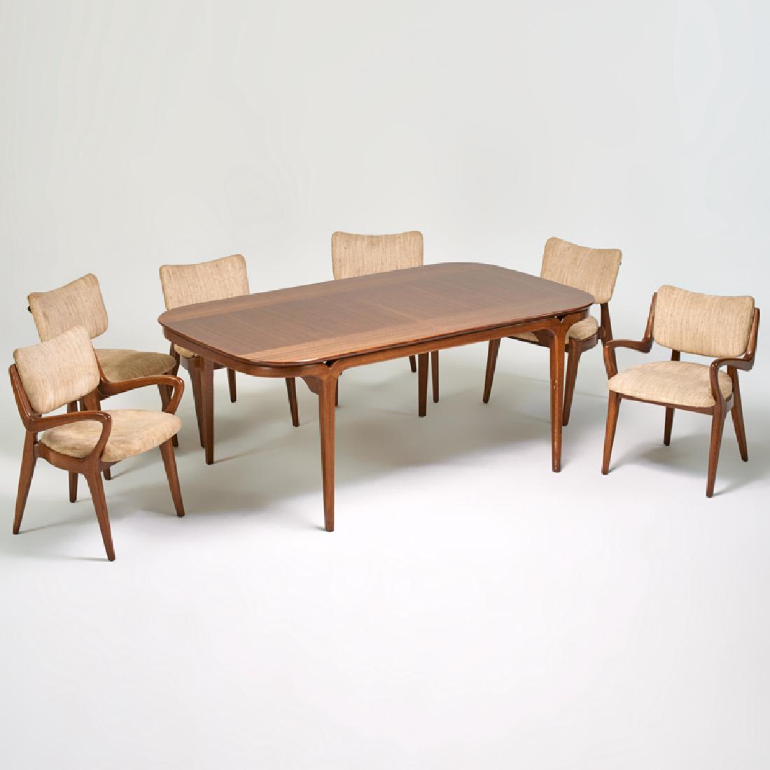 PAUL LASZLO (Attr.); BROWN SALTMAN: Dining table and six chairs, two arm chairs and four side chairs, USA, 1950s Mahogany, upholstery Decal label to dining table and numbered, chairs unmarked Arm: 31" x 21" x 23", side: 31" x 21 1/2" x