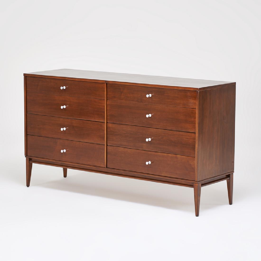 PAUL McCOBB; PLANNER GROUP: Eight-drawer dresser, Winchendon, MA, 1960s Stained wood, brushed metal Foil label: 33 1/2" x 60" x 18 1/2"