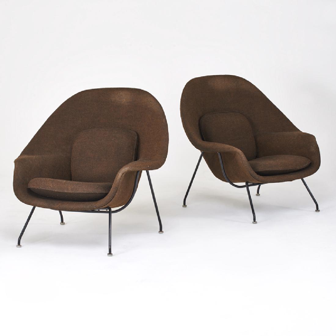EERO SAARINEN; KNOLL ASSOCIATES: Pair of Womb chairs, New York, 1960s Enameled steel, upholstery Unmarked 36" x 39 1/2" x 34"