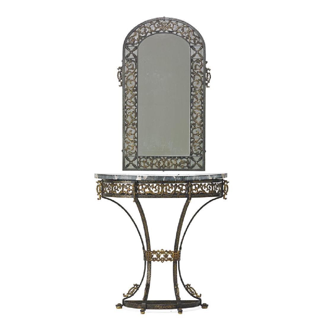 STYLE OF OSCAR BACH CONSOLE AND MIRROR: Arched mirror plate above a demilune console with tapered legs, wrought iron, brass, and marble Console: 30 1/2" x 30 1/4" x 11", mirror: 35" x 21 1/2"