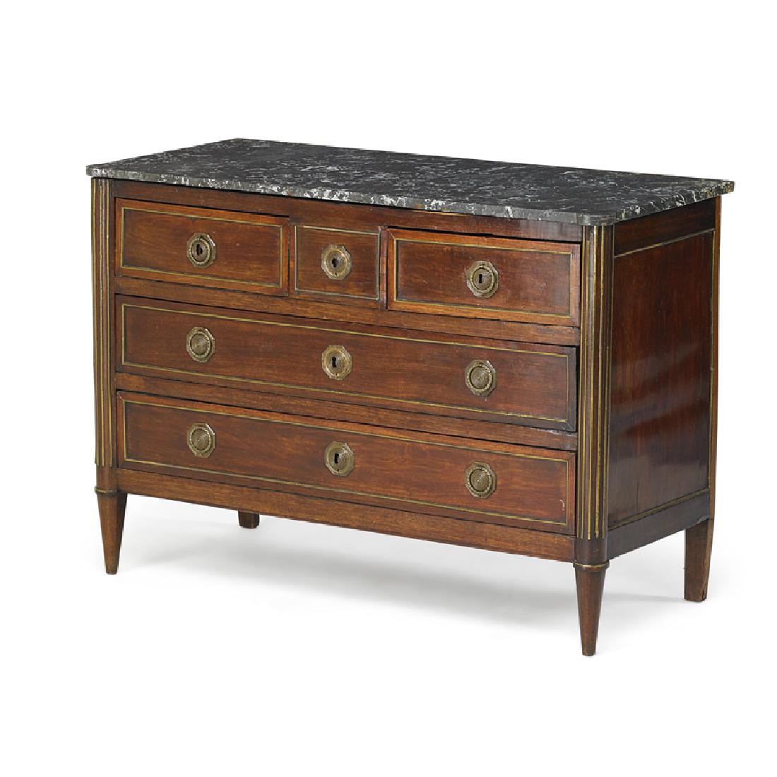 LOUIS XVI STYLE BRASS INLAID MAHOGANY COMMODE: Black veined marble top above an arrangement of drawers on tapered legs, France, 19th c. 36" x 50 3/4" x 21 1/2"