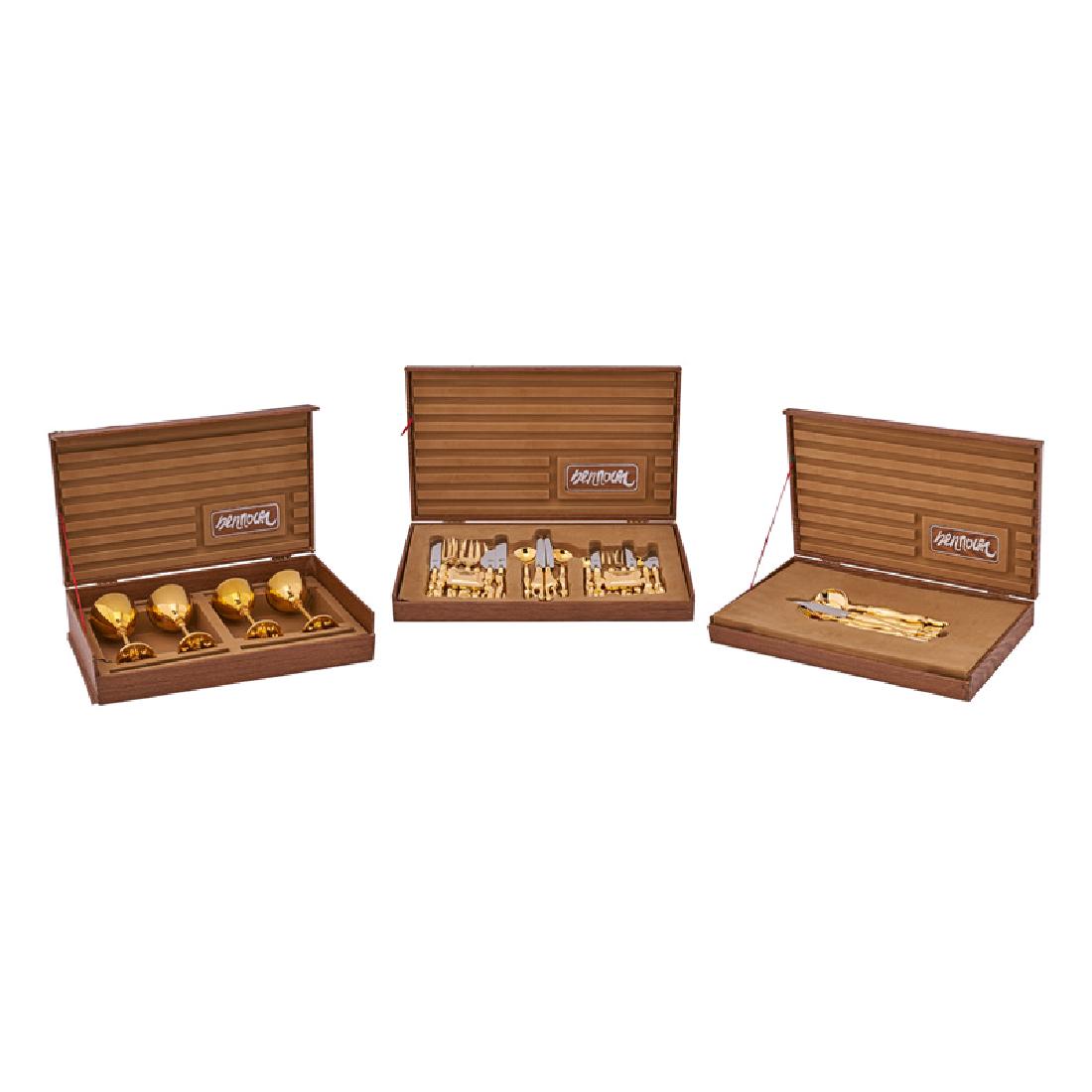 MIGUEL BERROCAL FLATWARE, ETC.: Posateria Veronese" pattern 18-piece flatware set for two (plus two ashtrays and one ring), one five-piece serving set, and four goblets (two water, two wine), Verona, Italy, designed 1970s Gilt metal