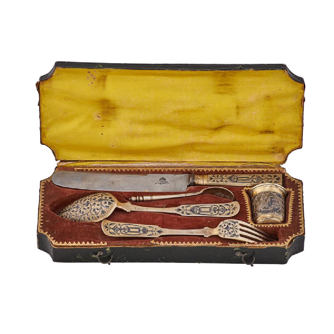 CASED RUSSIAN NIELLO SILVER TRAVEL PLACE SETTING: Five: Table fork, table knife, table spoon, dessert spoon and associated vodka cup, Moscow, ca. 1840, assay: Nikolay Dubrovin Marked, some illegibly Case: 2" x 11 3/4" x 4 3/4" 6.1 ozt (weighable)