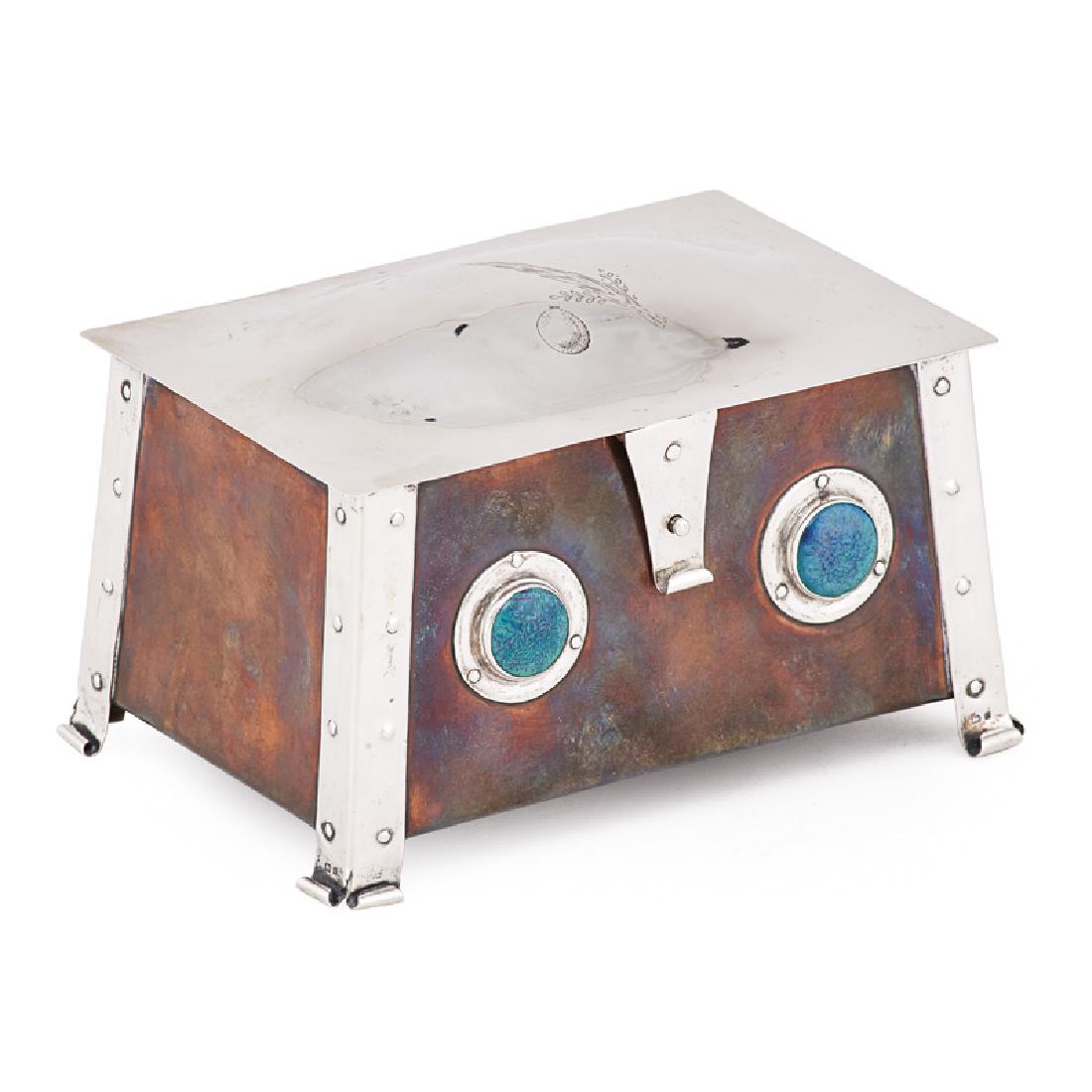 ENGLISH ARTS & CRAFTS JUDAICA: Etrog box in sterling silver, copper and enamel with wooden liner and Hebrew inscription on lid, Albert Edward Jones, Birmingham, 1904 Marked 4 1/4" x 6 1/2" x 4 1/4"