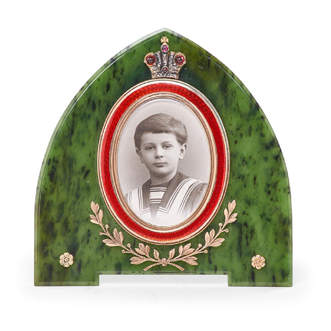 RUSSIAN PICTURE FRAME: Spinach jade with silver-gilt and enamel accents and semi-precious stones in crown, Russia, late 19th/early 20th Marked 4 3/4" x 4 3/4" x 3 1/2" (open)