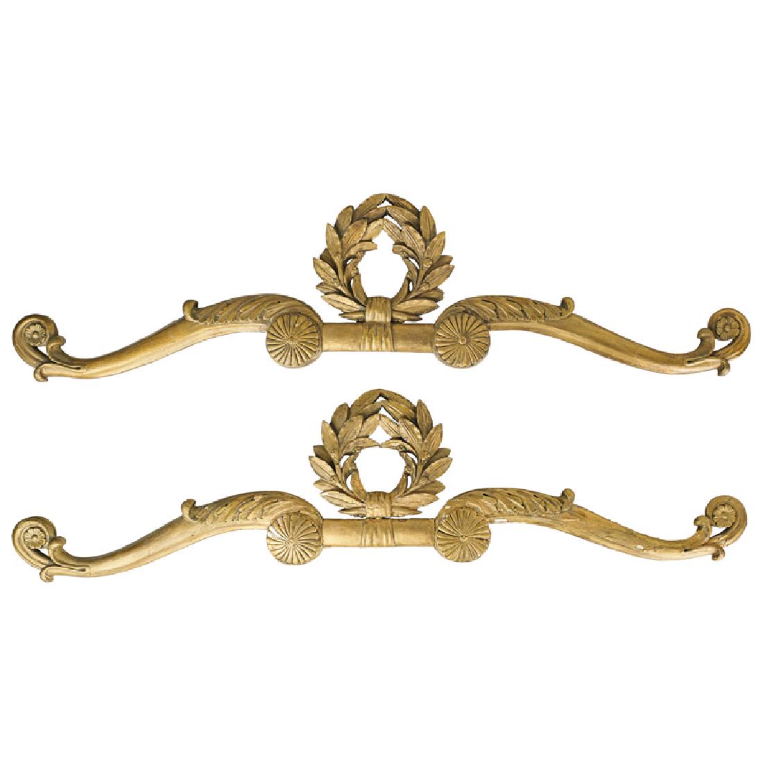 PAIR OF GILTWOOD PELMETS: Scrolling pediment with laurel wreath, Continental, late 19th/early 20th c. 12" x 50 1/2"