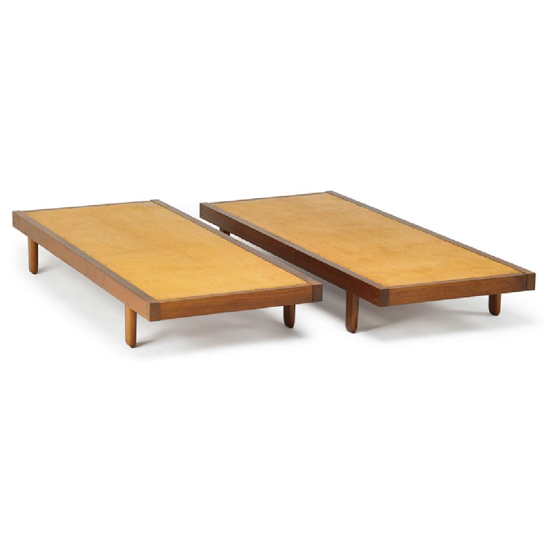 GEORGE NAKASHIMA Pair of daybeds: GEORGE NAKASHIMA (1905 - 1990) NAKASHIMA STUDIO Pair of daybeds, New Hope, PA, 1960 Walnut, birch plywood Each signed with client name 10" x 72 1/2" x 30" Provenance: Collection of Dr. William (Jack)