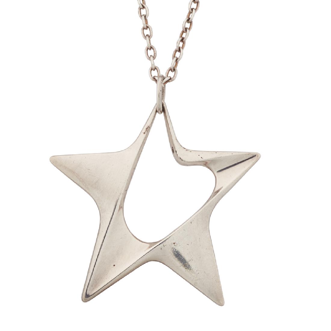 HENRY KOPPEL, GEORG JENSEN STERLING STAR PENDANT: An open-form star, on unassociated silver chain. Pendant stamped with Jensen Post-War cypher, Denmark 147. 2 1/4" x 2 1/4", 29". 32.8 gs.