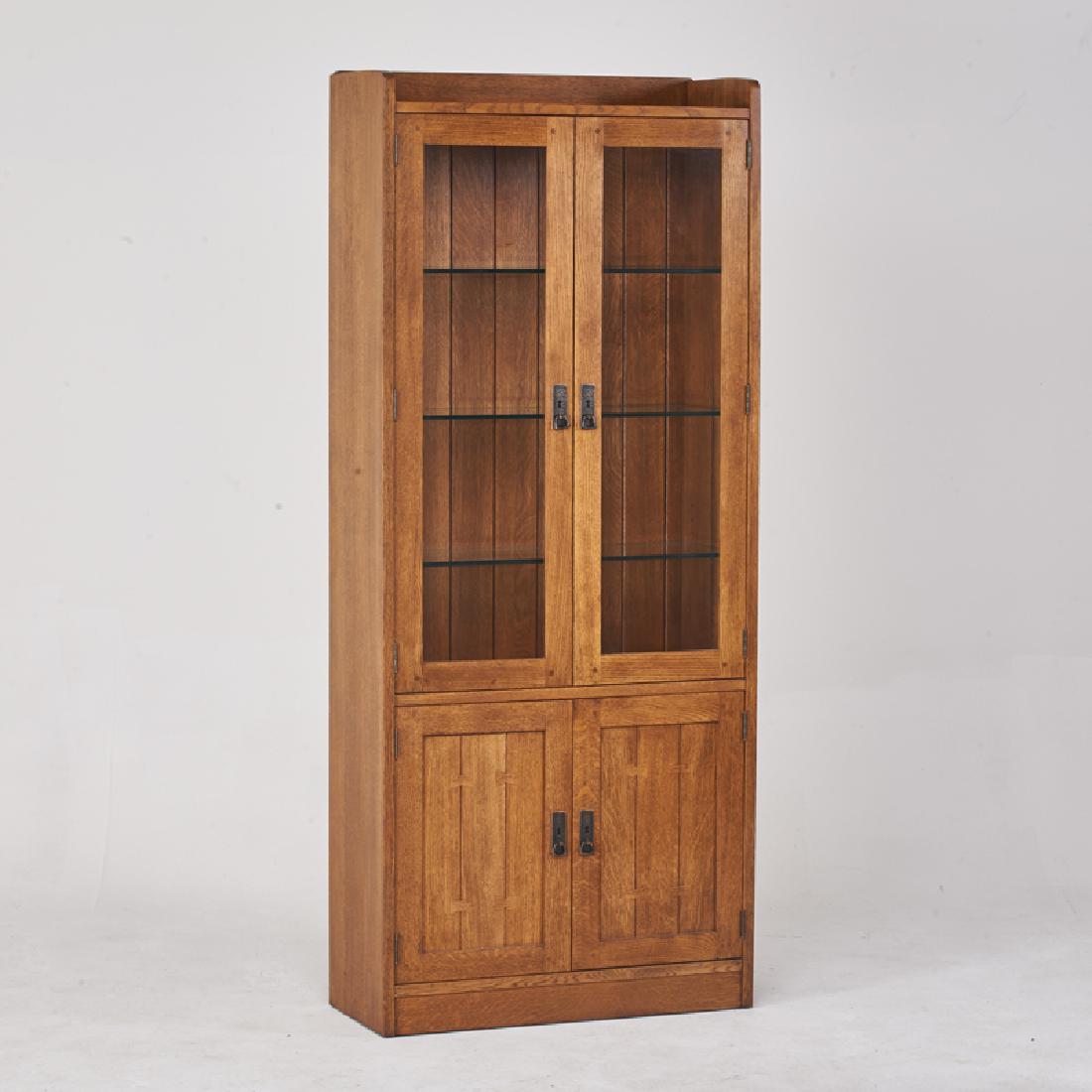 STICKLEY; E.J. AUDI: Contemporary china cabinet, Manlius, NY, 1997 Quartersawn oak, patinated metal, glass Metal tag, branded mark 80" x 34" x 14"