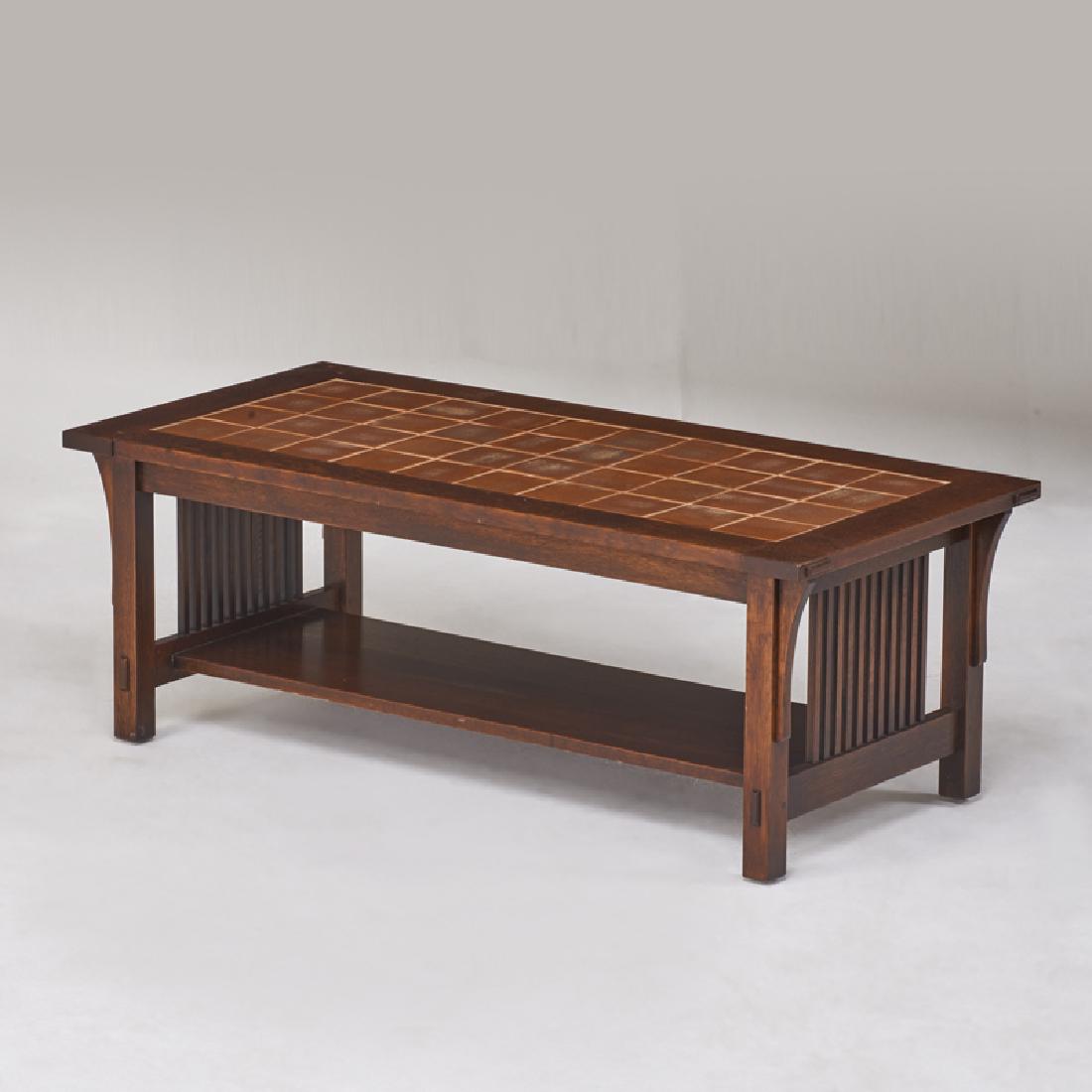 STICKLEY; E.J. AUDI: Contemporary spindled tile-top coffee table, Manlius, NY, 1990s Quartersawn oak, glazed ceramic tile Metal tag, branded mark 17 1/2" x 48" x 22 1/2"