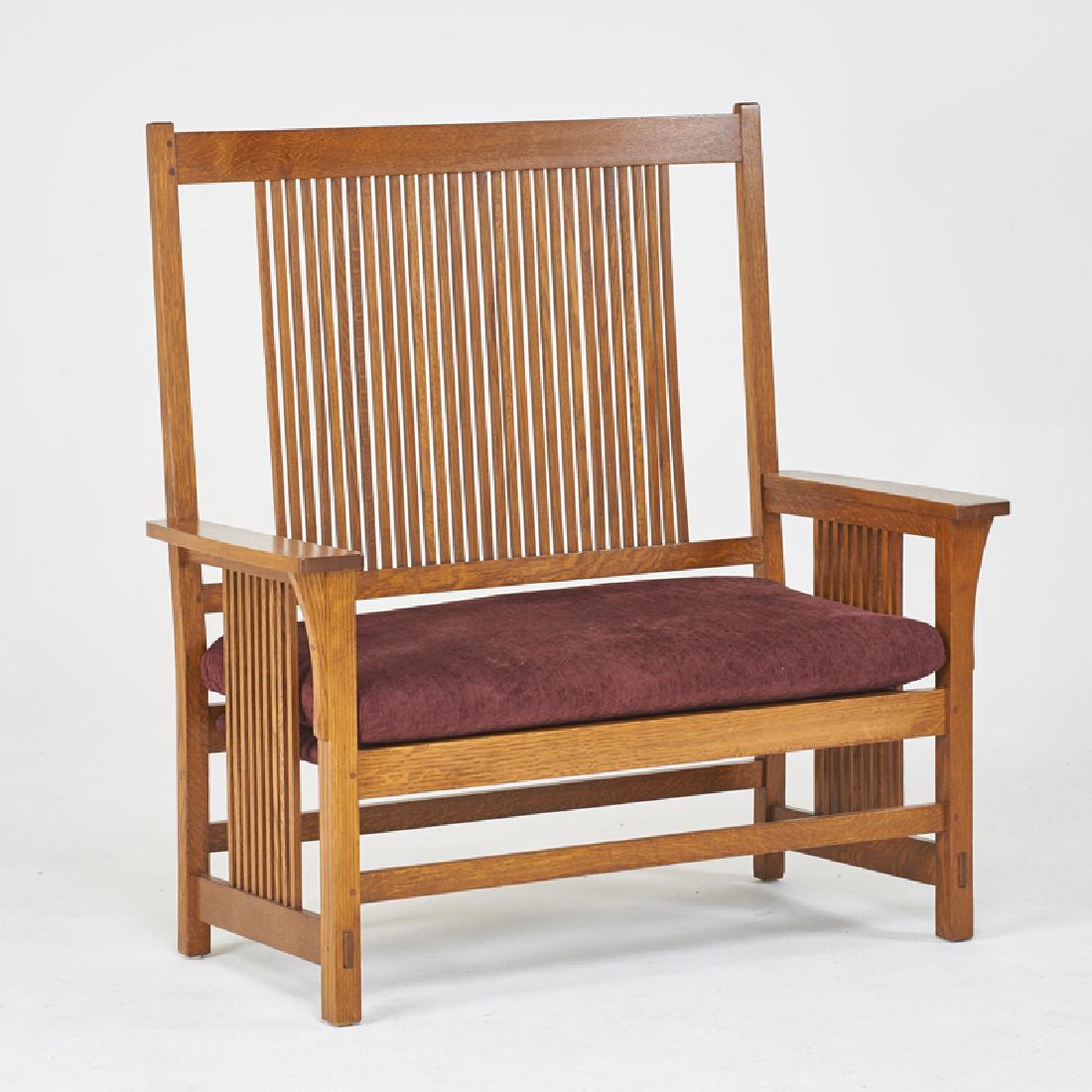 STICKLEY; E.J. AUDI: Contemporary spindled high-back settee, in the style of Gustav Stickley, Manlius, NY, 2000s Quartersawn oak, chenille upholstery Unmarked 49" x 48" x 22 1/2"