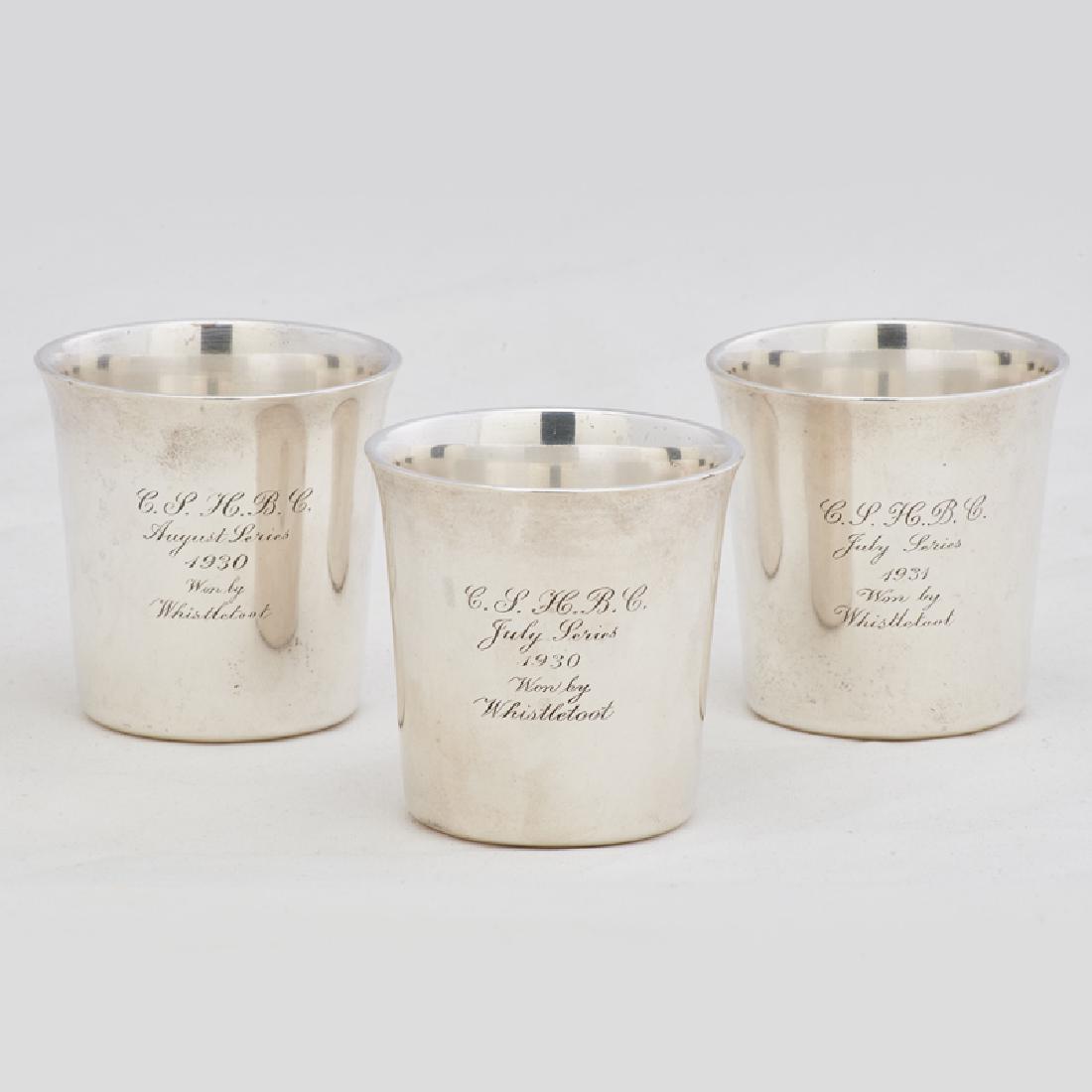 TIFFANY & CO.: Sterling beakers, reproductions of original design by Ludwig Heck Lancaster (ca. 1760), New York, 1930 Manufacturer and sterling silver marks 2 1/2" x 2 1/2" dia.,10.97 OT (weighable) Provenance avail