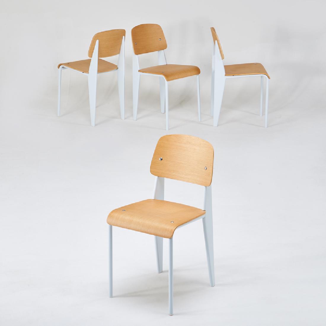STYLE OF JEAN PROUVE: Set of four white "Standard" chairs, 2000s Enameled steel, oak, laminated plywood Unmarked 32" x 16" x 19 1/2"