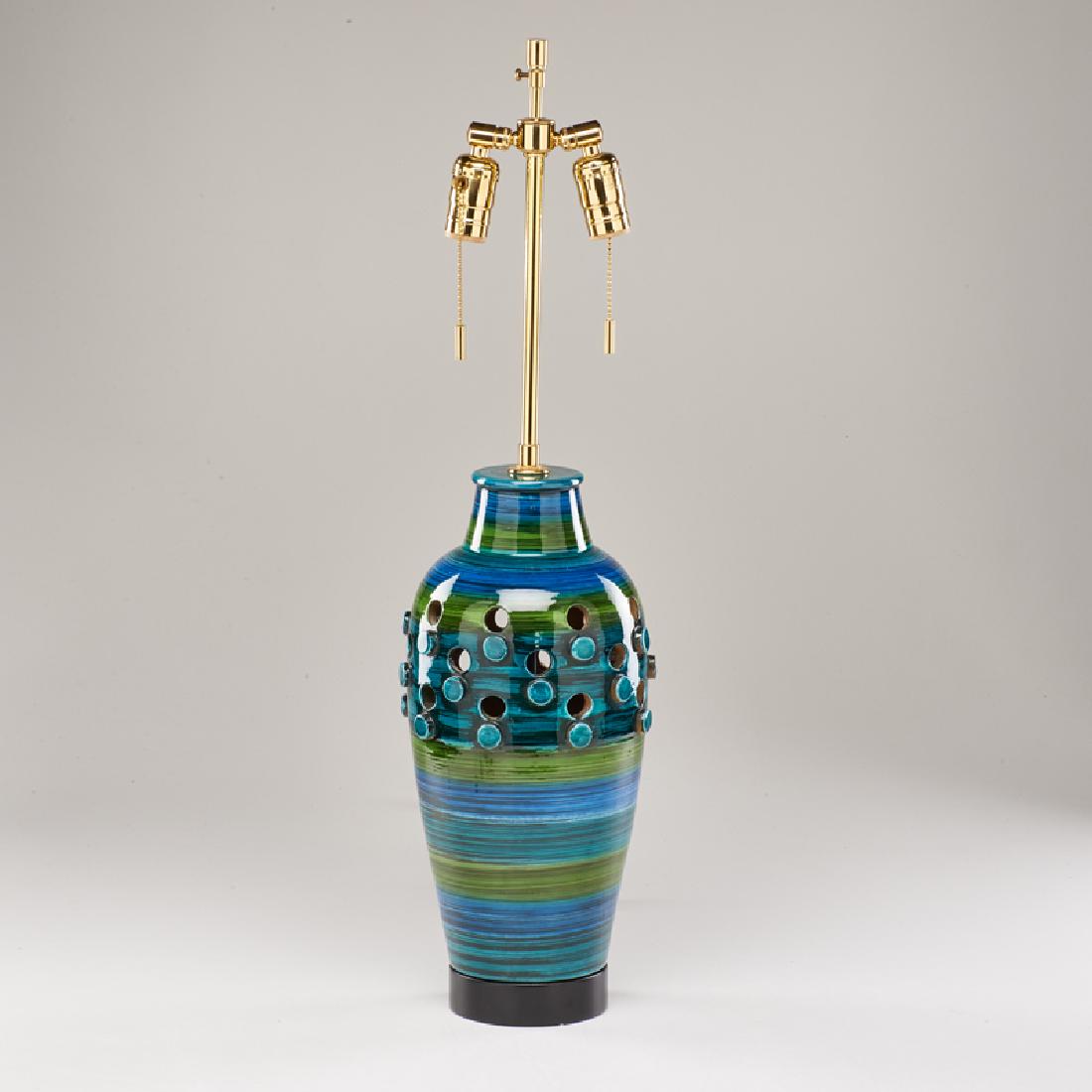 BITOSSI; RAYMOR: Blue and green table lamp with cut-outs and applied discs, Italy, mid 20th c. glazed ceramic, lacquered wood, polished brass fittings Signed "PL 312 Base Made Italy" 29" x 7" dia.
