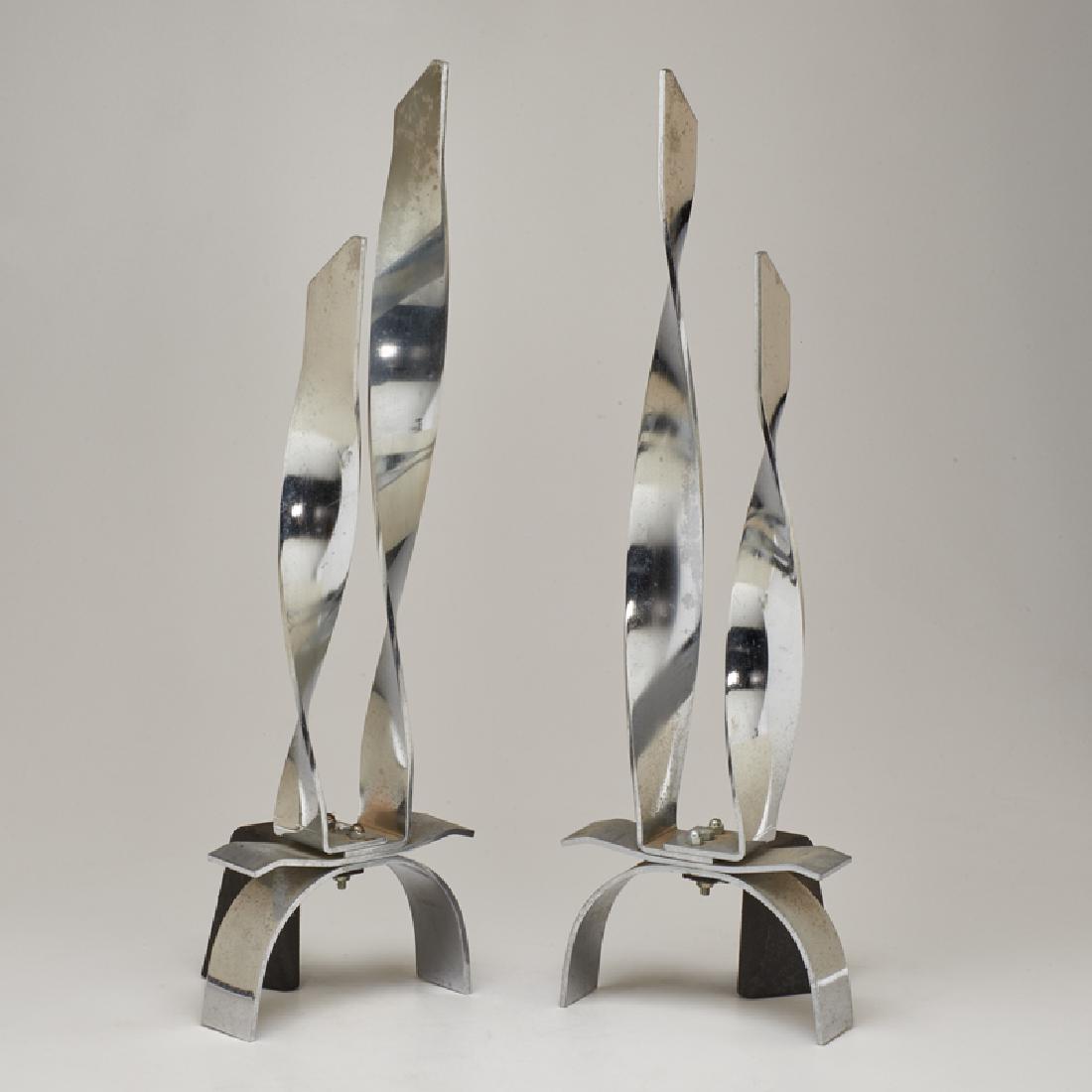 DONALD DESKEY: Pair of Art Deco twisted andirons, USA Chromed metal, iron Unmarked 25"