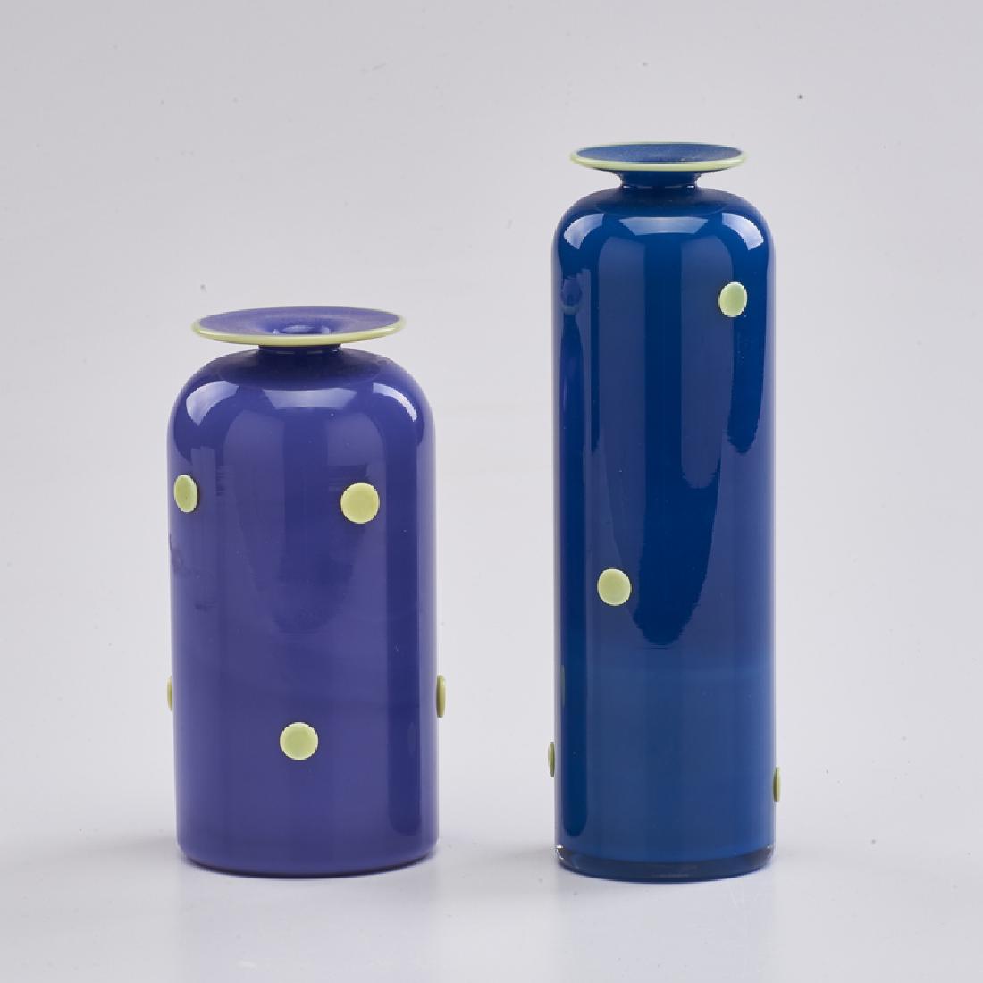 SCANDINAVIAN: Two glass vases with applied polka dots, 20th c. Both signed illegibly Taller: 7" x 2 1/4" dia.