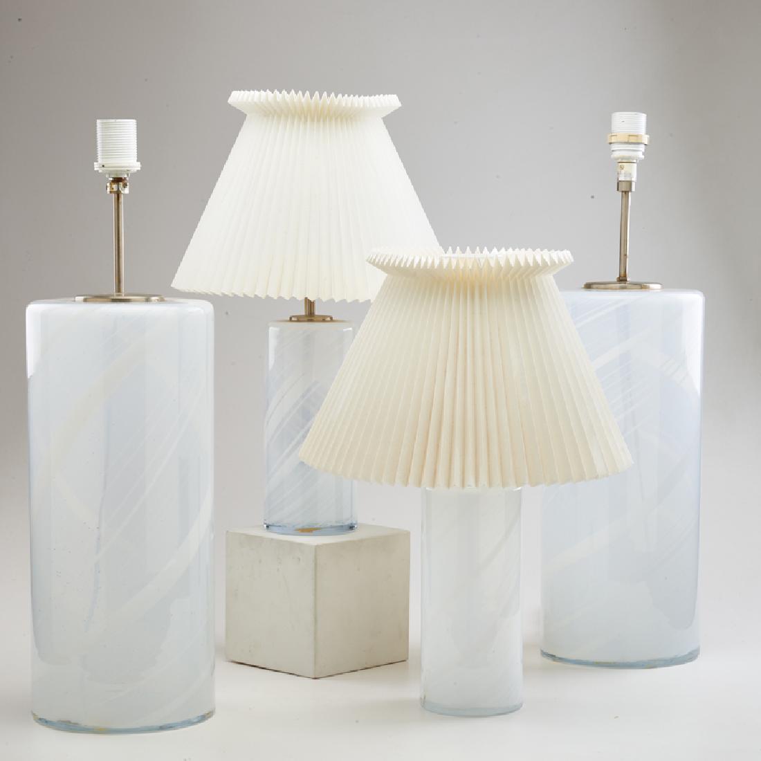 TORBEN J¯RGENSEN; HOLMEGAARD: Two pair of cylindrical table lamps with spiraling decoration, Denmark, ca. 1970s Opaline glass, metal fittings One labeled Larger pair: 24" x 7 1/2" dia.