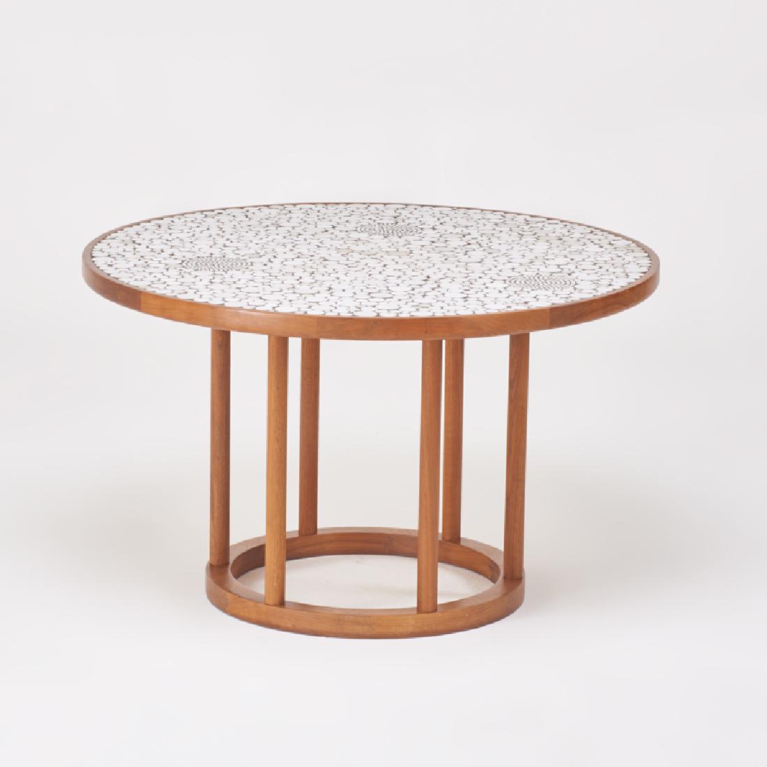 GORDON & JANE MARTZ; MARSHALL STUDIOS: Tile top breakfast table, USA, 1950s Walnut, glazed ceramic tile, grout Unmarked 26" x 42 1/2" dia.