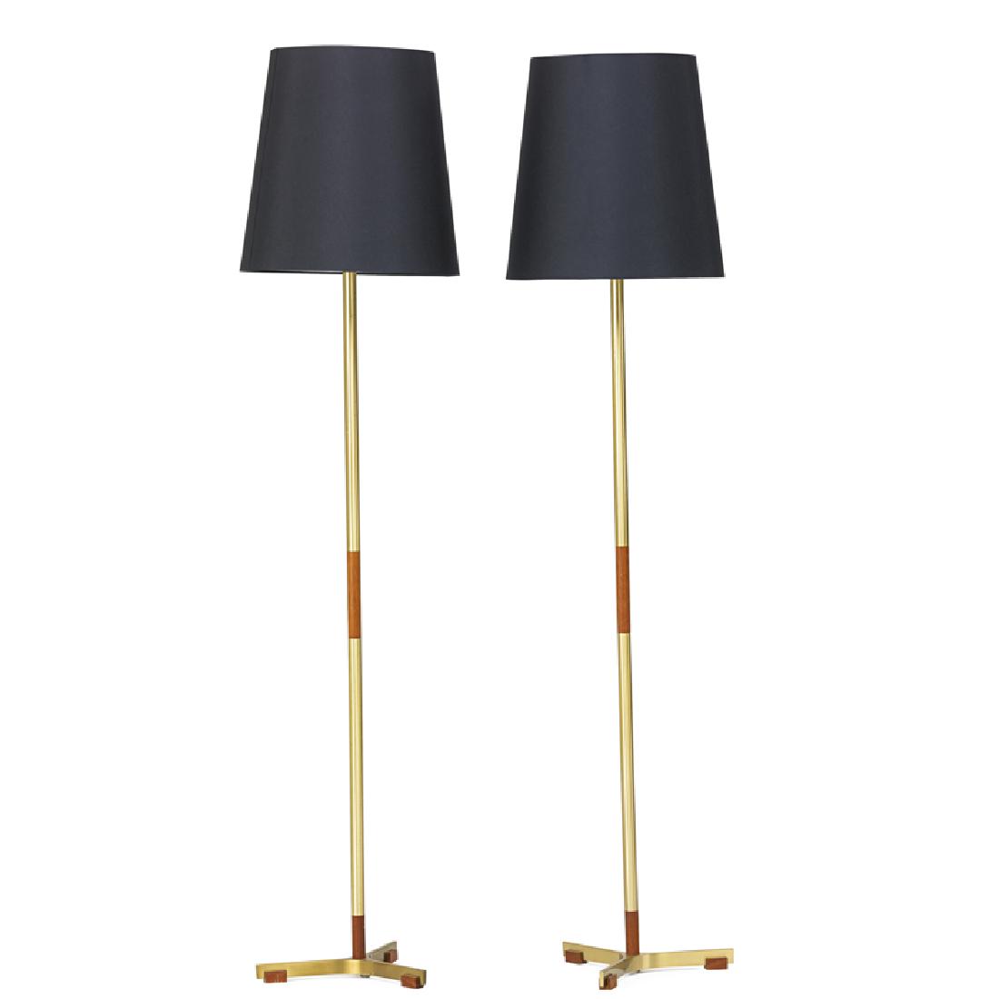 JO HAMMERBORG Pair of floor lamps: JO HAMMERBORG (1920 - 1982) Pair of floor lamps, Denmark, 1960s Brass, teak, linen shades, single sockets Unmarked 67 1/2" x 16" dia.