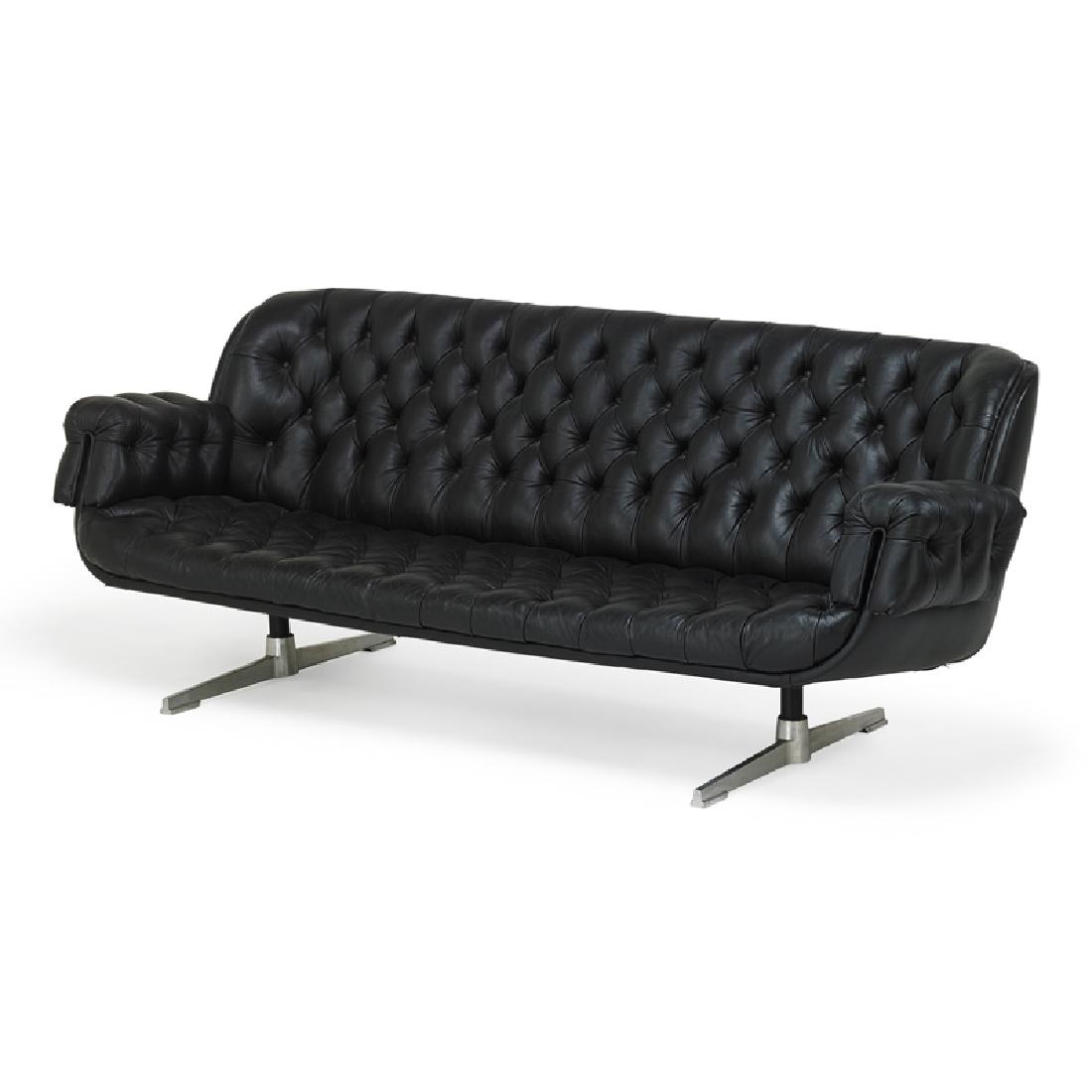 ROBERT HAUSSMANN Sofa: ROBERT HAUSSMANN (b. 1931) Sofa, Switzerland, 1960s Tufted leather, enameled steel, polished aluminum Unmarked 29 1/2" x 81" x 34"