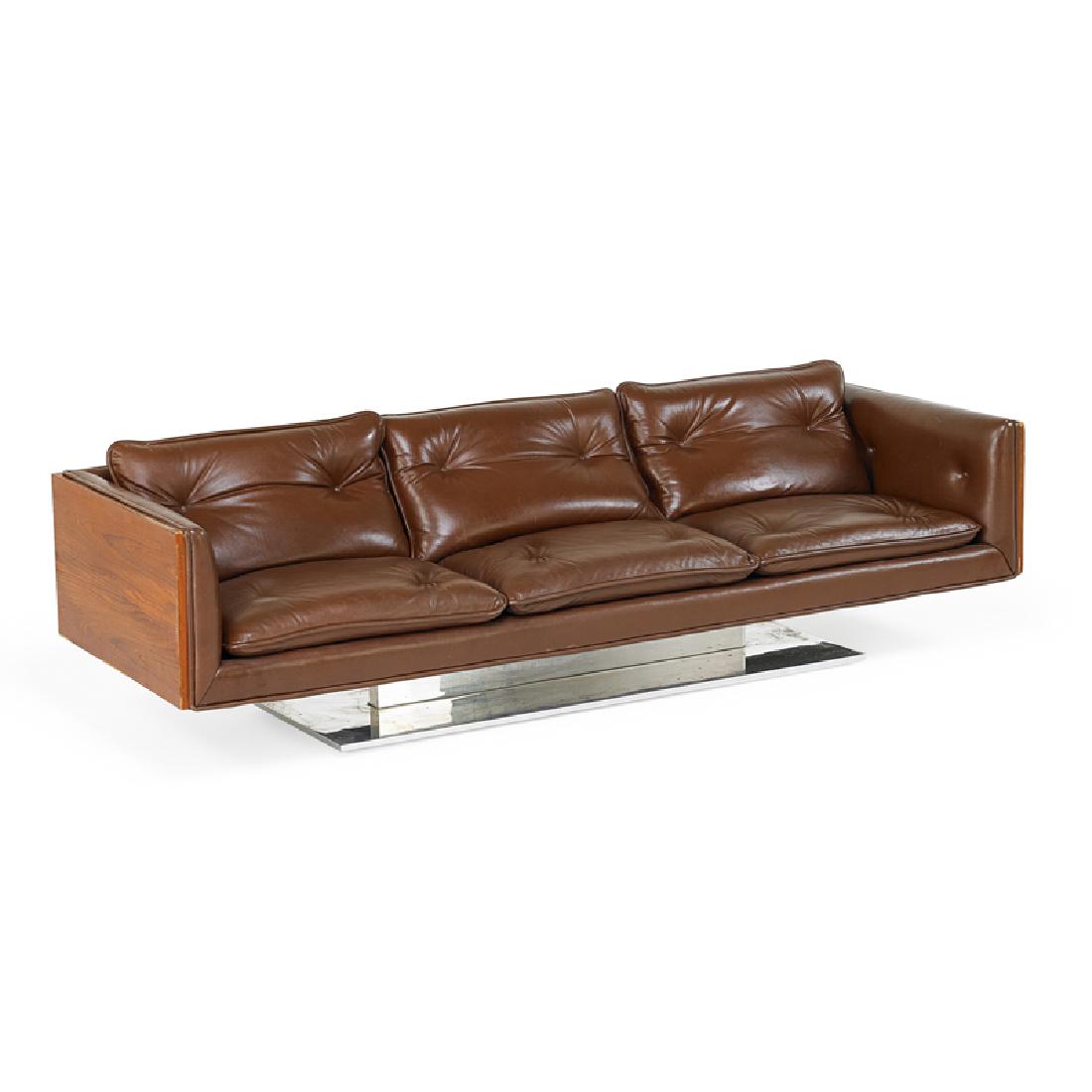 WARREN PLATNER Sofa: WARREN PLATNER (1919 - 2006) LEHIGH LEOPOLD Sofa, USA, 1970s Polished aluminum, teak, leather Manufacturer label 25" x 93" x 31"
