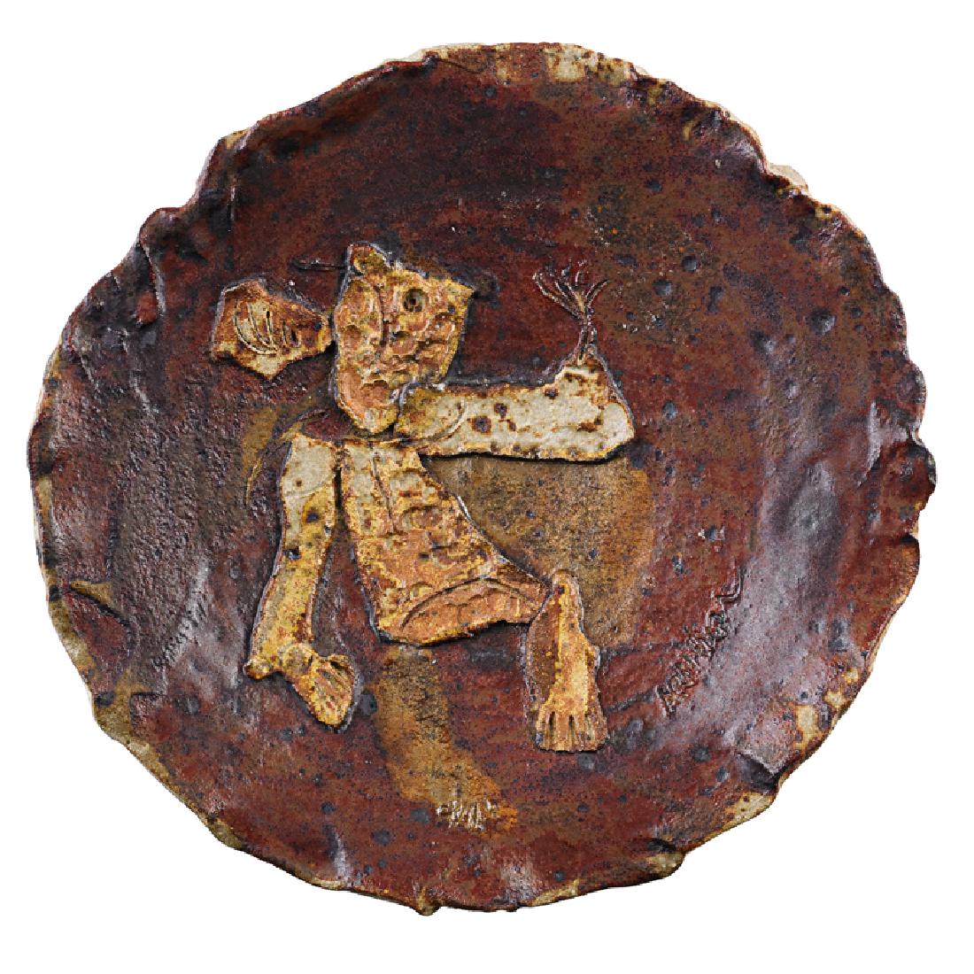 ROBERT ARNESON Small charger: ROBERT ARNESON (1930 - 1992) Small charger with abstract figure, California, mid-20th C. Glazed stoneware Signed 2" x 9 1/4"