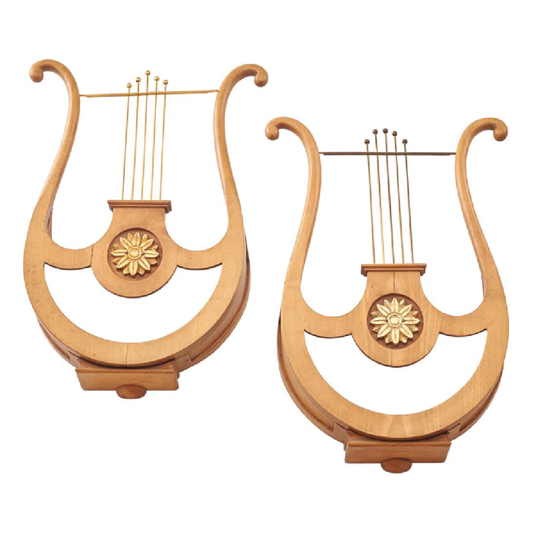 PAIR OF ITALIAN LYRE FORM WALL SHADES: Mounted birch wall shades with opalescent glass panels and gilt-bronze accents, Venice, Italy, late 1940s/early 1950s 15" x 10 1/2" Note: Architectural ornamentation from a Venetian cinema