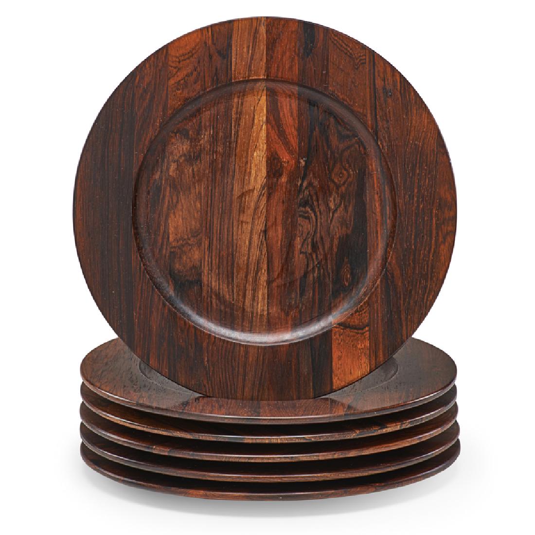 JENS QUISTGAARD FOR DANSK ROSEWOOD PLATES: Set of six, Denmark, 1960s; 10 1/2" dia.