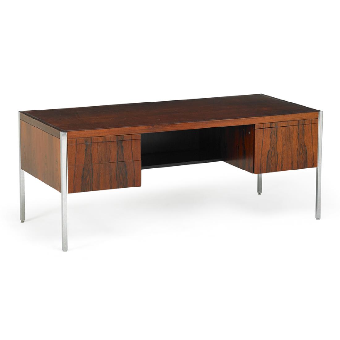 RICHARD SCHULTZ FOR KNOLL ASSOCIATES DESK: Rosewood and chromed steel pedestal desk, New York, 1960s; Manufacturer label; 29 1/2" x 72" x 32"