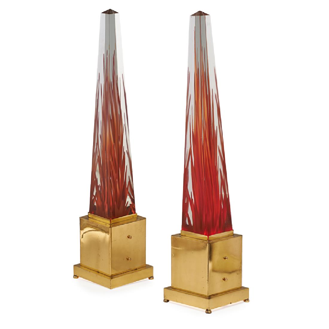 PAIR OF FULVIO BIANCONI MURANO GLASS OBELISKS: Each with "flames" radiating upward, mounted on electrified brass bases, Italy, 20th c.; Each with etched signature; Obelisks: 23 1/2" x 3 3/4" sq.
