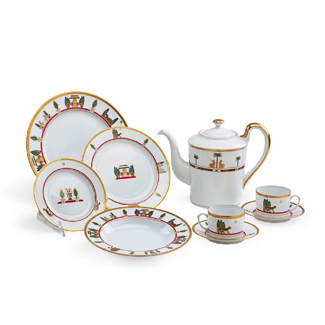 CARTIER "LA MAISON LOUIS" DINNERWARE: Seventy-three pieces, service for twelve: (12) coffee cups with saucers, (12) soup bowls, (12) salad plates, (12) bread plates, (12) dinner plates, and associated Christian Dior "Casablanca" coffee po