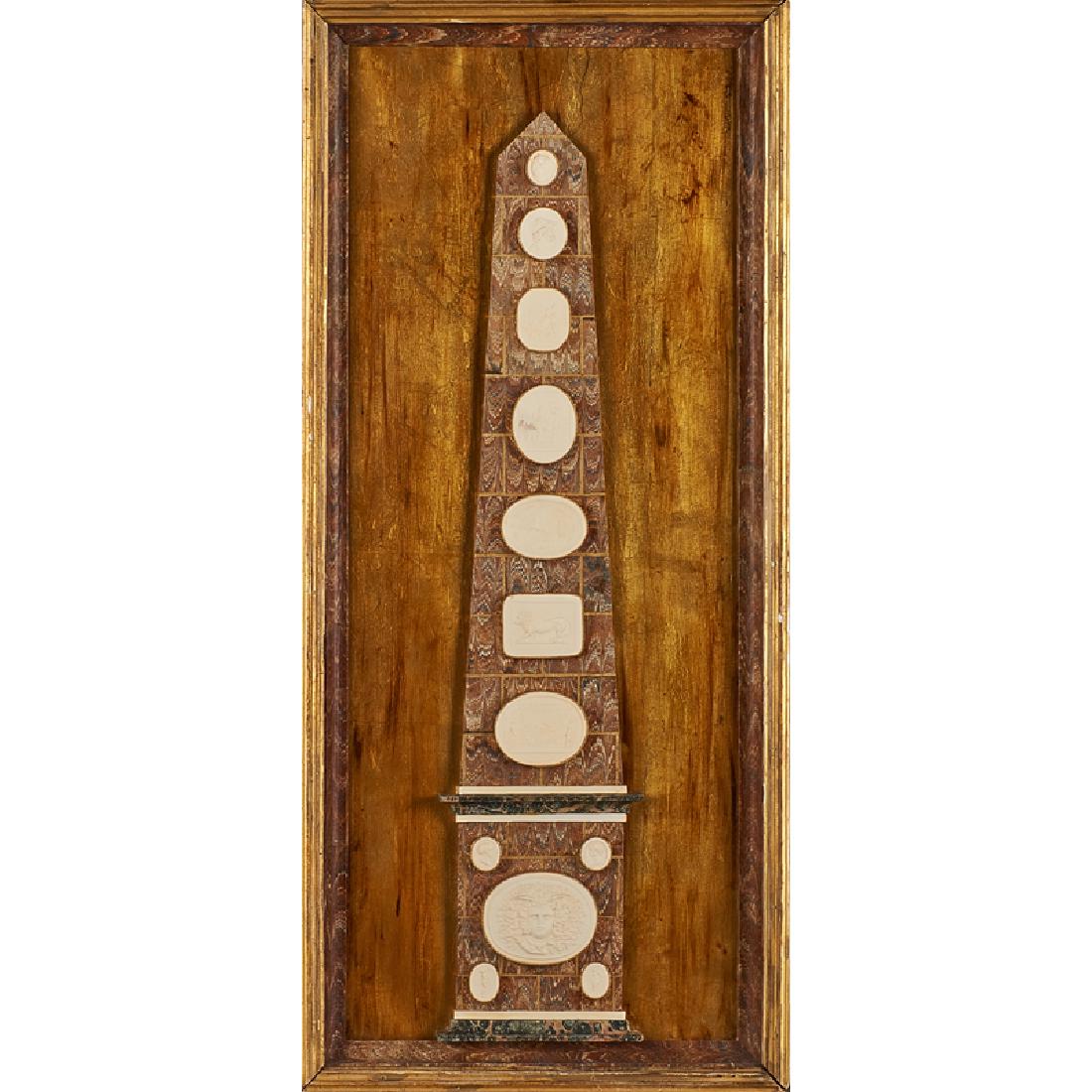 GRAND TOUR INTAGLIO DISPLAY: Intaglios including Classical scenes, animals, portraits, and astrological signs mounted on raised marbleized paper obelisk, in giltwood frame, Continental, late 19th c.; 34 1/2" x 15 1/2"