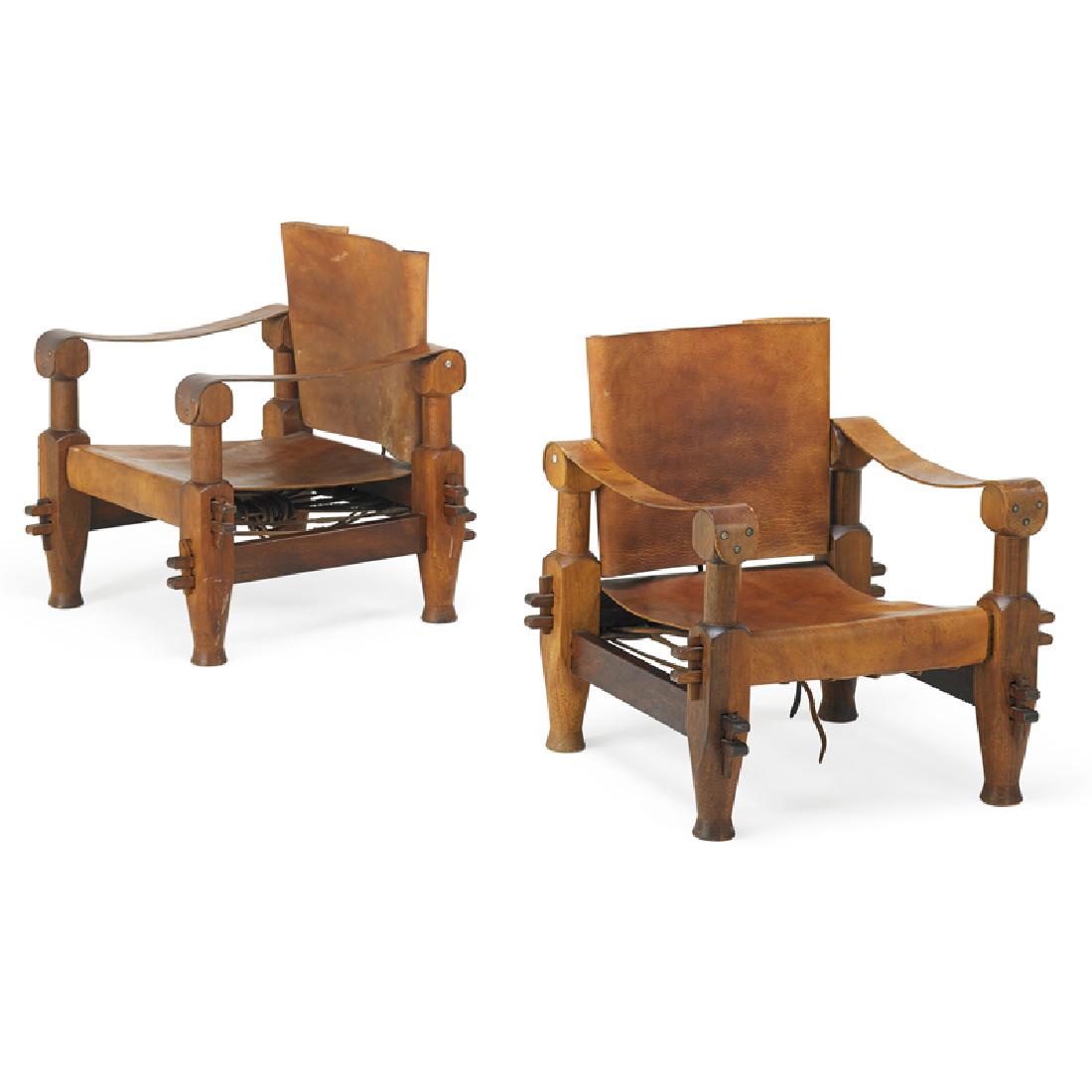 PAIR OF NEPALESE LOUNGE CHAIRS AND SIDE TABLE
