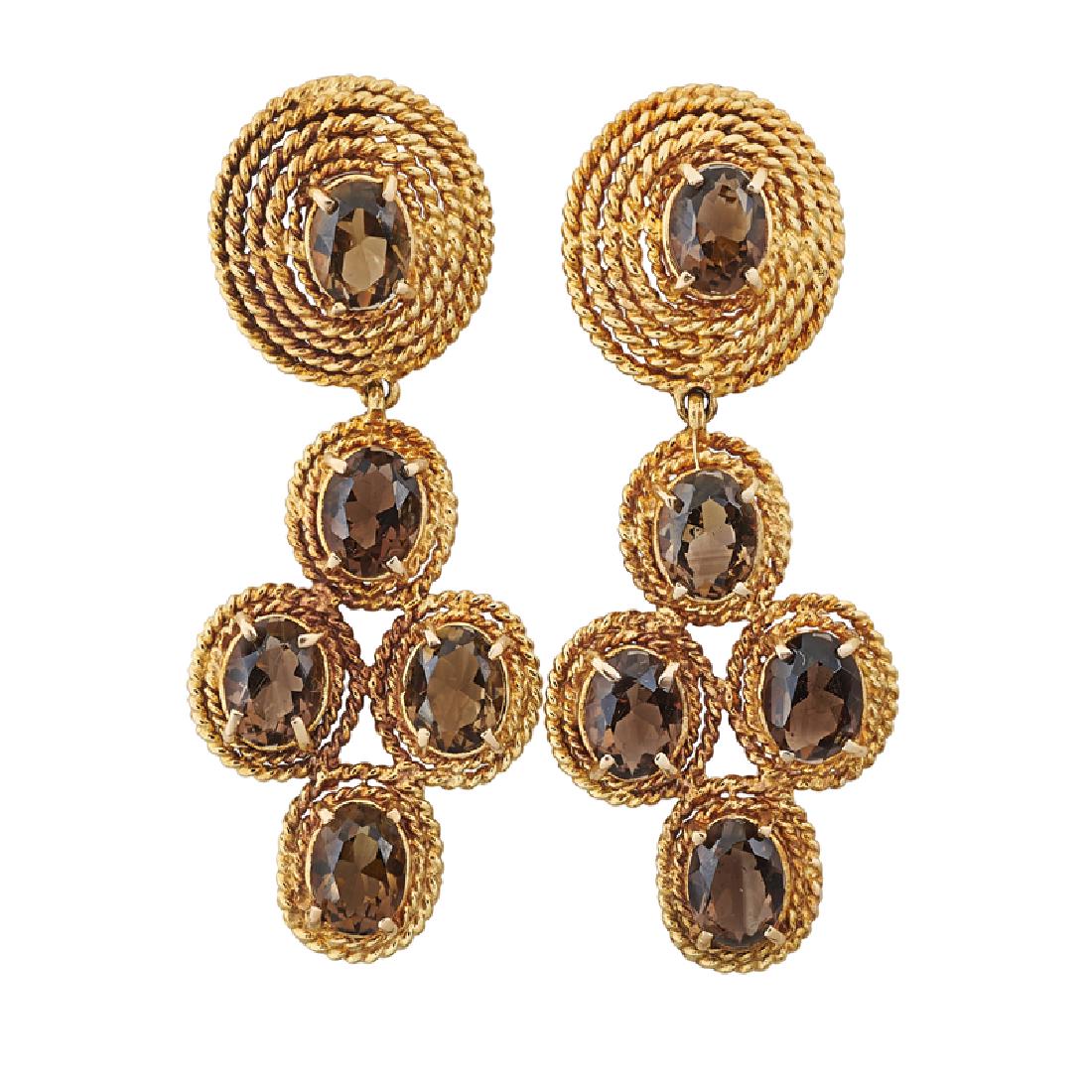 SMOKY QUARTZ YELLOW GOLD EARRINGS: Each a cluster of oval-faceted quartz in roped gold. 14k. 2 1/4". 11.2 dwt.