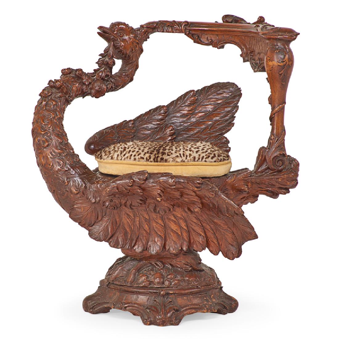 ITALIAN FANTASY DRESSING CHAIR: Carved in the form of a mythological bird with outstretched wings and feathered tail, Italy (likely Venice), circa 1880 30" x 29" x 24" Reference: Newman, Bruce M. Fantasy Furniture. New York: Rizzoli