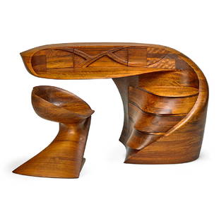 MICHAEL COFFEY Fine desk and chair: MICHAEL COFFEY El Moro desk and Matador II chair, Massachusetts, des. 1974 Laminated and carved African Mozambique Both signed Desk: 37" x 69" x 36", chair: 26 1/2" x 23" x 27" Provenance: Private col