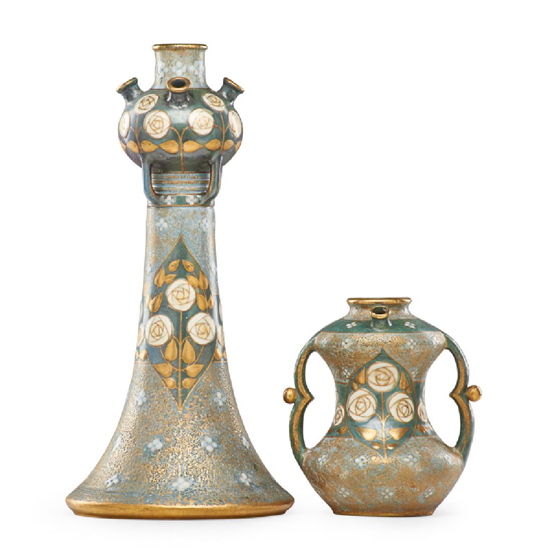 PAUL DACHSEL Two floral Amphora vases: PAUL DACHSEL Two geometric Amphora vases with stylized roses, Turn-Teplitz, Bohemia, ca. 1907 Red PD stamp to each 13 3/4", 6" Published: Scott, Ceramics from the House of Amphora 1890 - 1915, 2004, p