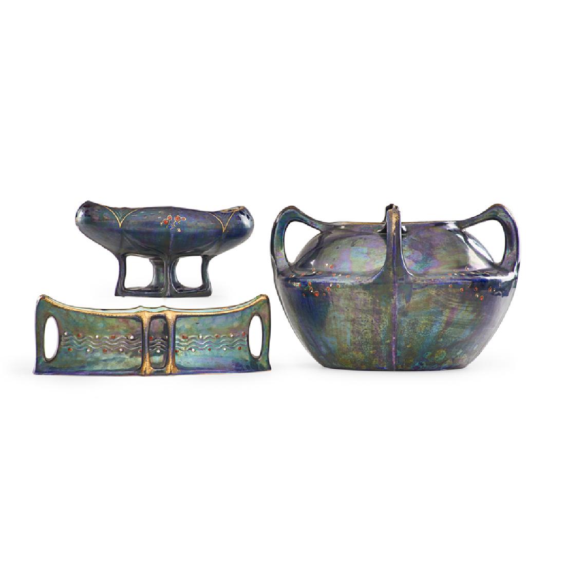 EDUARD STELLMACHER & CO. Three vessels: EDUARD STELLMACHER (1868 - 1945) EDUARD STELLMACHER & CO. Three Amphora vessels with stylized dot pattern, Turn-Teplitz, Bohemia, ca. 1907 All with raised Stellmacher seal Largest: 7 1/4" x 10 1/2" Pu