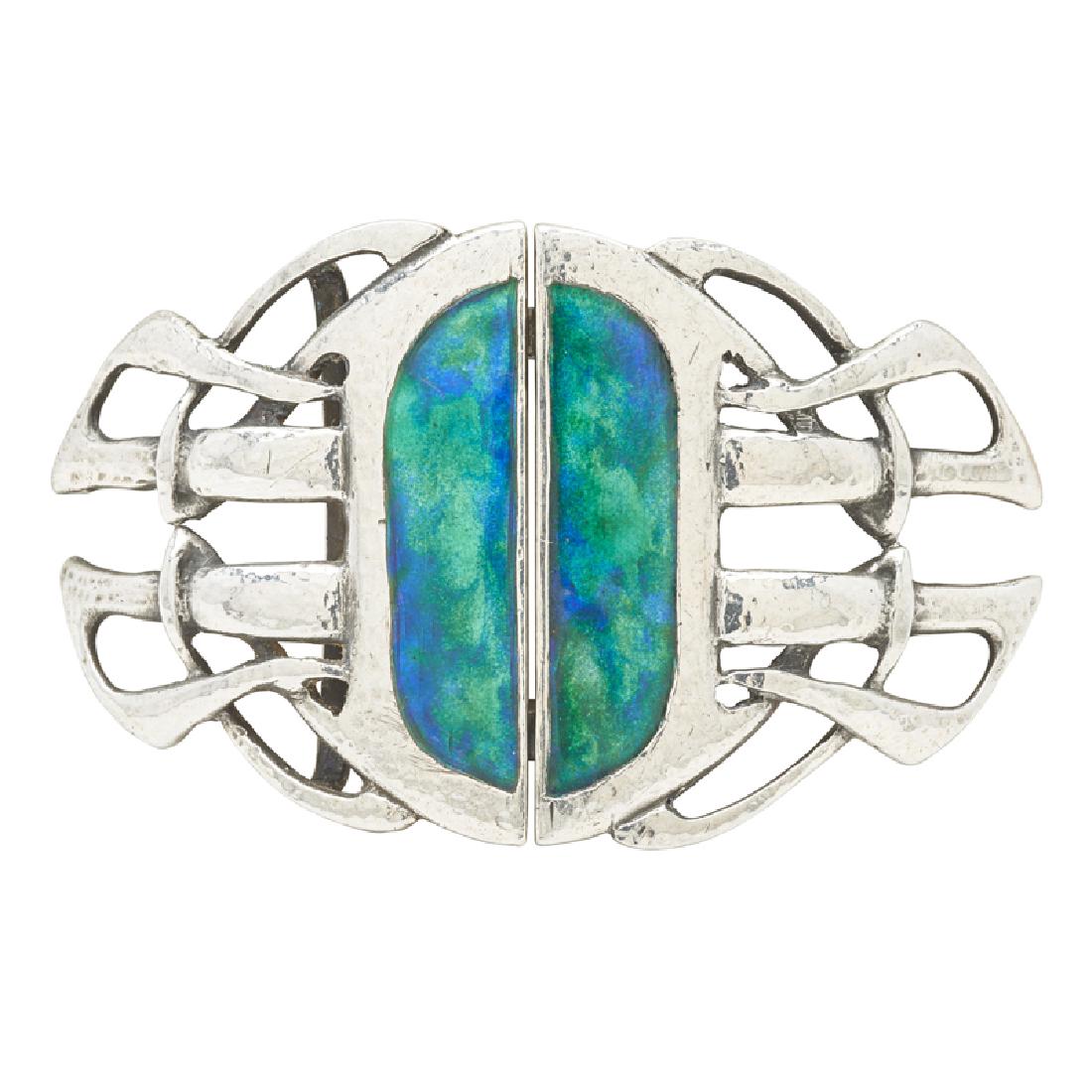 ARCHIBALD KNOX; LIBERTY & CO. Cymric buckle: ARCHIBALD KNOX (1864 - 1933) LIBERTY & CO. Cymric belt buckle, England, 1903 Sterling silver, enamel One side stamped L & CO. with anchor, lion, and date mark d, the other stamped with lion and date m