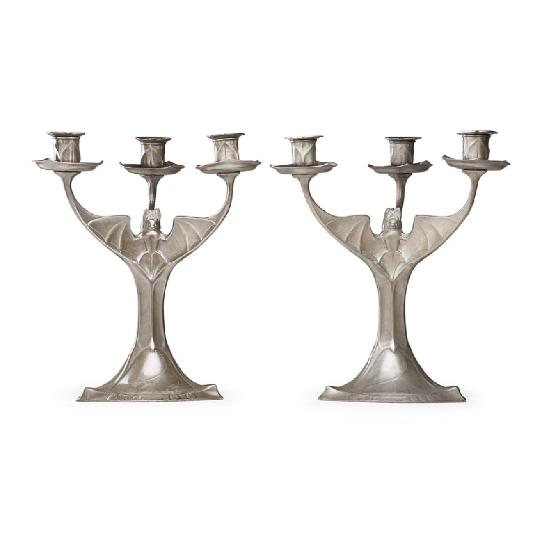 HUGO LEVEN; KAYSERZINN Two bat candelabra: HUGO LEVEN (1874 - 1956) KAYSERZINN Two Art Nouveau candelabra with bats, Germany, ca. 1900 Pewter Both marked 12" x 10 1/2" x 10" ea.